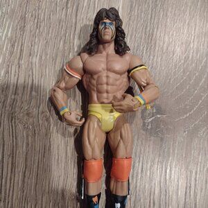 WWE Ultimate Warrior wrestling 2013 action figure in good condition